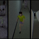 A screenshot from Murder House showing the triple-split camera window as the player runs from a bunny-suited killer.